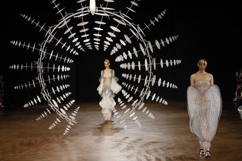 A model wears a creation for Iris van Herpen Haute Couture Fall-Winter 2019-2020 fashion collection presented in Paris, Monday, July 1 2019. (AP Photo/Francois Mori)