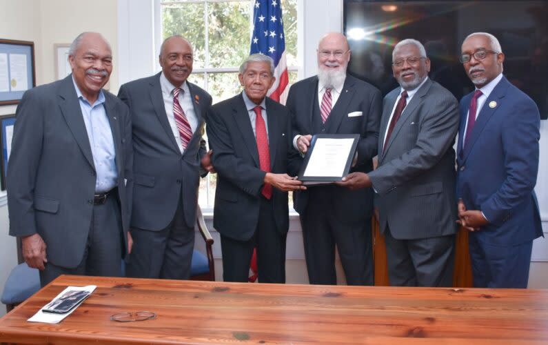 Civil rights activist and former South Carolina legislator Jim Felder, Clemson University’s Dr. Roy Jones, photographer Cecil Williams, attorney Tom Mullikin, plaintiff family member Nathaniel Briggs and state Rep. Terry Alexander on the day Mullikin filed his Supreme Court petition. (Mullikin Law Firm)