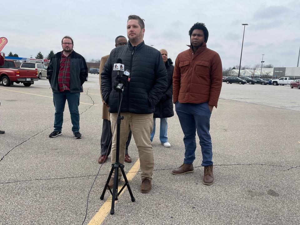 Nick Hamann speaks during a Friday press conference to address the looming closure of the Walmart on Portage Avenue.