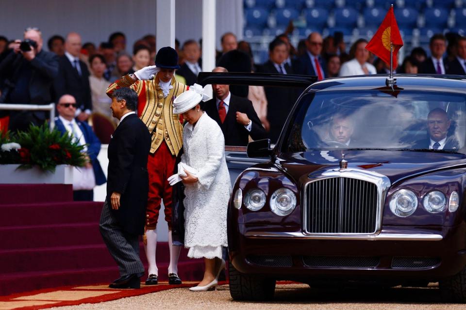 Emperor Naruhito and Empress Masako arrive for a Ceremonial Welcome at Horse Guards Parade (AFP via Getty Images)