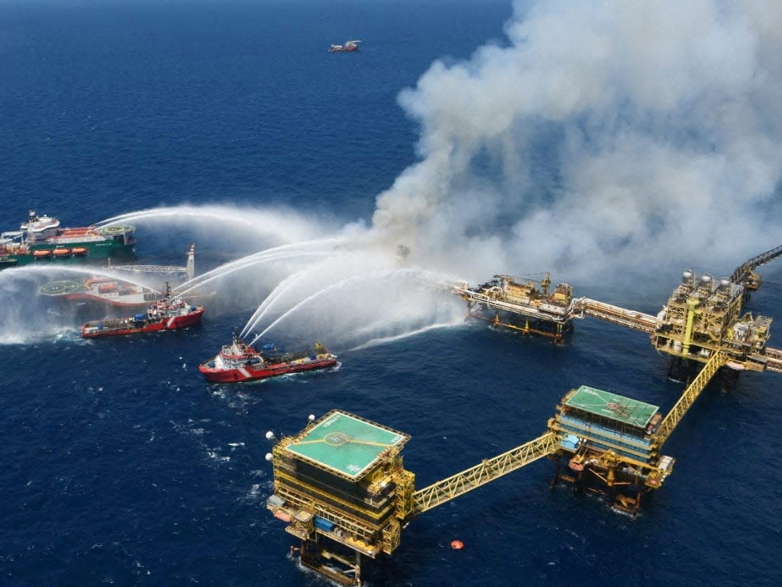 Fire fighting ships seen hosing the fire in the Gulf of Mexico