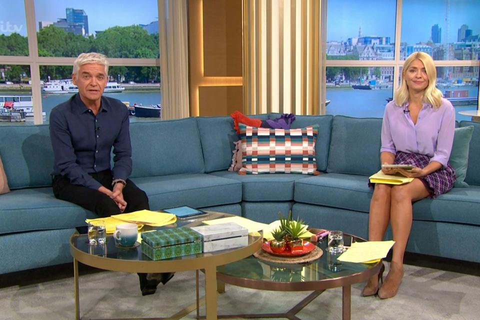 Phillip Schofield and Holly Willoughby on the This Morning sofa (Rex Features)