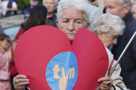 People demonstrate in defense of media freedom in Warsaw, Poland, on Tuesday, Aug. 10, 2021. Poles demonstrated nationwide Tuesday against a bill widely viewed as a effort by the country's nationalist ruling party to silence an independent, U.S.-owned television broadcaster that is critical of the government.(AP Photo/Czarek Sokolowski)