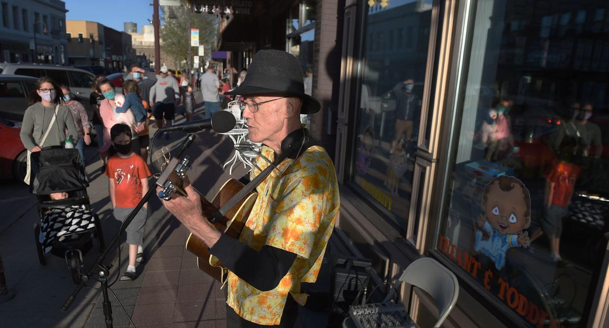 Rick Exner performs in front of Duck Worth Wearing during a past year's Music Walk in downtown Ames. A longtime participant in the Music Walk, Exner returns to Duck Worth Thursday night for this year's event.