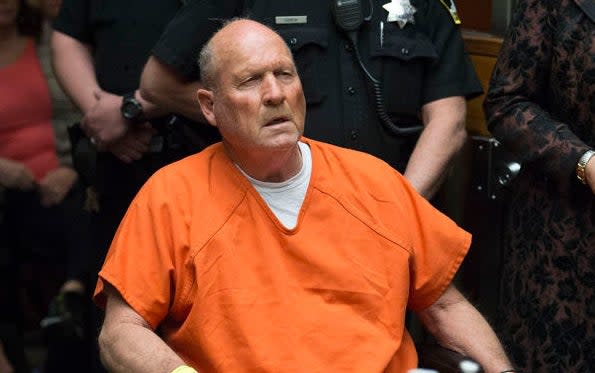 Joseph James DeAngelo in court in an orange prison jumpsuit