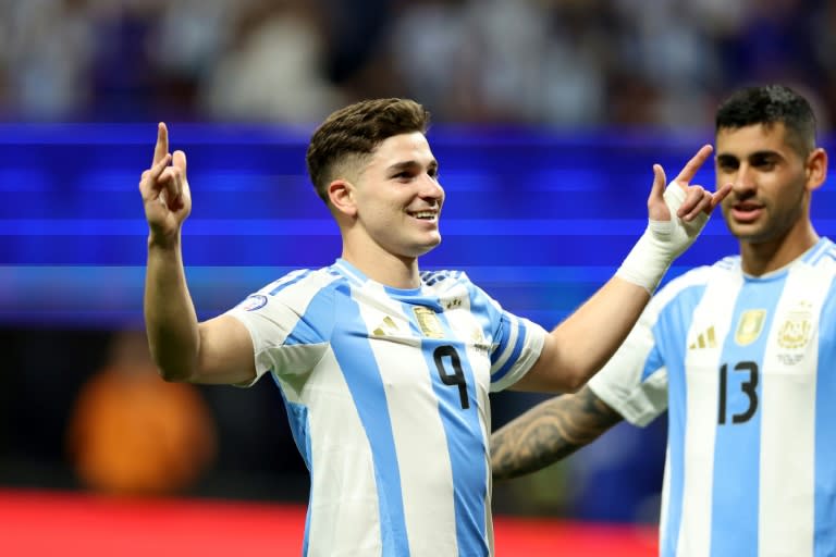 Argentina striker <a class="link " href="https://sports.yahoo.com/soccer/players/3862636/" data-i13n="sec:content-canvas;subsec:anchor_text;elm:context_link" data-ylk="slk:Julian Alvarez;sec:content-canvas;subsec:anchor_text;elm:context_link;itc:0">Julian Alvarez</a> celebrates scoring during his team's Copa America group A match against Canada on Thursday. (CHARLY TRIBALLEAU)