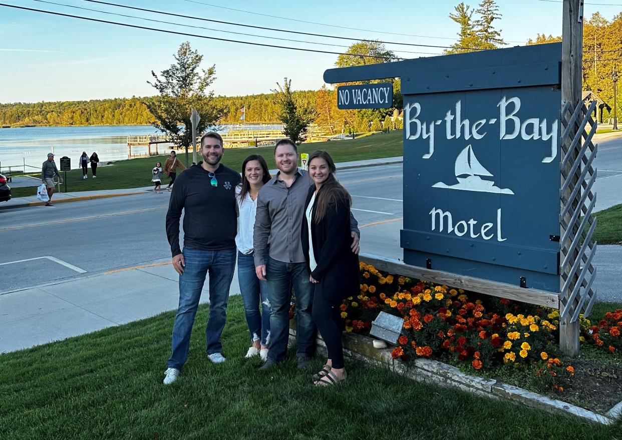 Mitch Ehly, Katie Wanzer, Luke Nelsen and Katie Nelsen, from left, are partners in Fresh Coast Motel, the contactless, luxury boutique motel they're creating at the site of the former By-the-Bay Motel, across the street from Fish Creek Beach, in downtown Fish Creek.