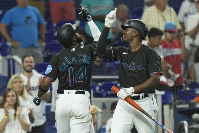 Rockies homer five times, smash Marlins 14-2