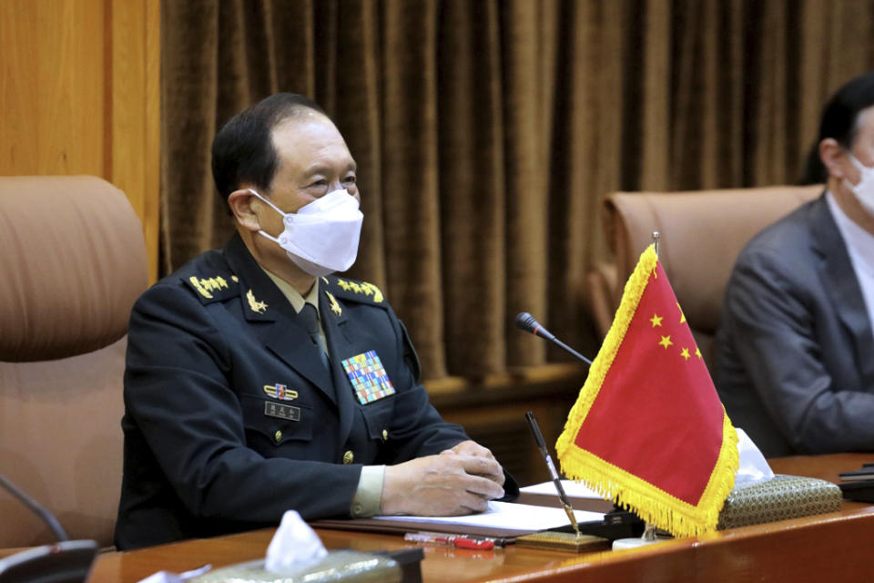 In this picture released by the official website of the Iranian Defense Ministry, China's minister of national defense Gen. Wei Fenghe attends a meeting with Iran's defense minister Gen. Mohammad Reza Ashtiani, in Tehran, Iran, Wednesday, April 27, 2022. (Iranian Defense Ministry via AP)