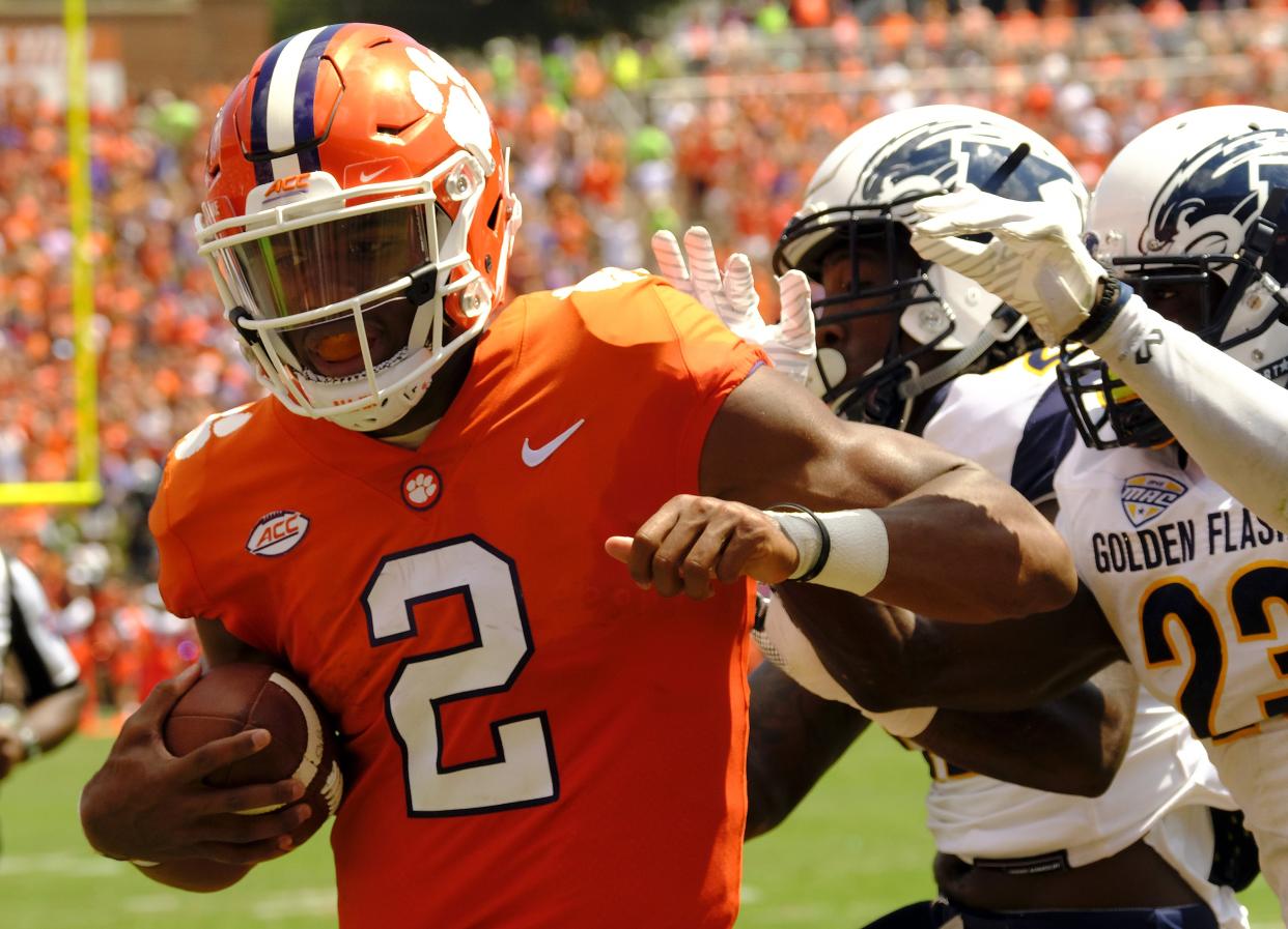 Kelly Bryant (L) of the Clemson Tigers scores a touchdown against the Kent State Golden Flashes. (Photo by Todd Bennett/Getty Images)