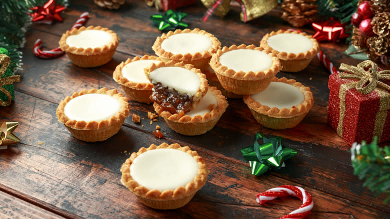 Iced mince pies with Christmas tree decorations