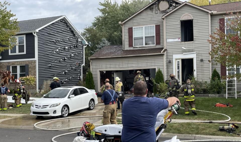 Electrical issues are suspected in this fire on Wellington Place in Dayton Thursday. Damage was estimated around $70,000. (Eric Higgenbotham/Staff)