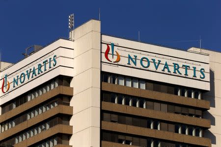 The logo of Swiss pharmaceutical company Novartis is seen on its headquarters building in Basel, Switzerland October 27, 2015. REUTERS/Arnd Wiegmann/File Photo