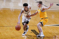 Vanderbilt guard Scotty Pippen Jr. (2) drives against Valparaiso guard Sigurd Lorange (1) in the first half of an NCAA college basketball game Friday, Nov. 27, 2020, in Nashville, Tenn. (AP Photo/Mark Humphrey)