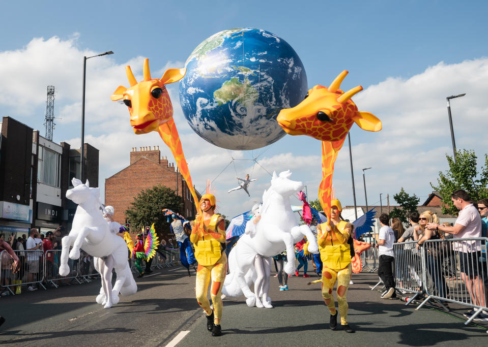 <p>Costumed performers, giant puppets and inflatables during the the Earth Spectacular celebration in Wakefield. Picture date: Sunday September 5, 2021. (Photo by Danny Lawson/PA Images via Getty Images)</p>
