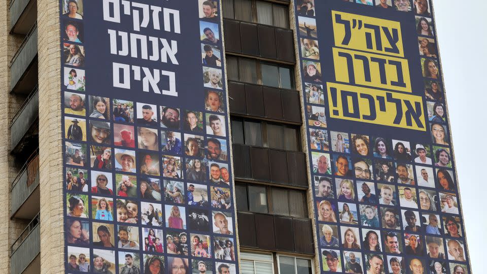 A billboard in Jerusalem bears the portraits of Israeli hostages taken by Palestinian militants. - Ahmad Gharabli/AFP/Getty Images