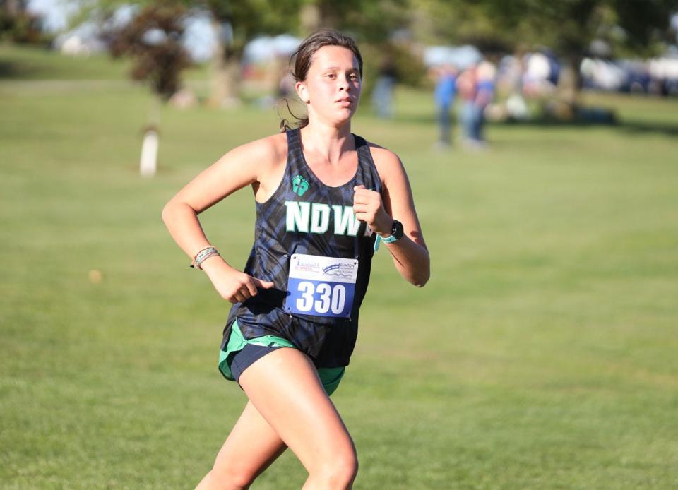 Notre Dame-West Burlington's Hannah Fruehling won  the Winfield-Mount Union cross country meet Thursday at Twin Lakes Golf Course in Winfield.