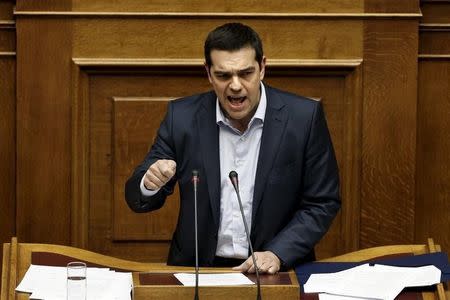 Greek Prime Minister Alexis Tsipras addresses lawmakers during a parliament session in Athens March 30, 2015. REUTERS/Alkis Konstantinidis