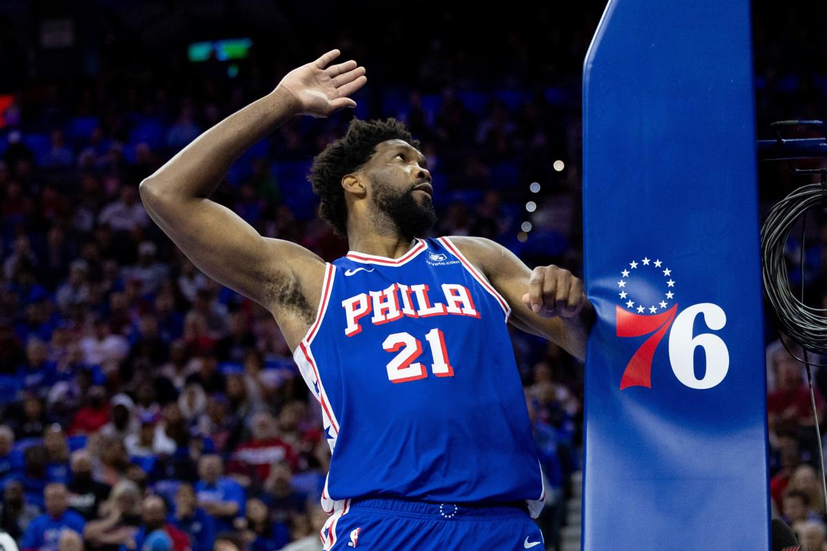 NBA Fines Joel Embiid for Repeatedly Imitating WWE Wrestler Triple H’s Celebration