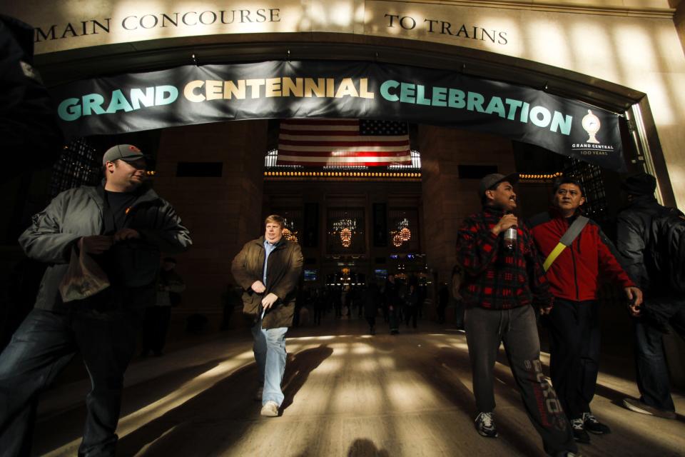 Commuters walk inside Grand Central Station in New York, February 2, 2013. Grand Central Terminal, the doyenne of American train stations, is celebrating its 100th birthday. Opened on February 2, 1913, the iconic New York landmark with its Beaux-Arts facade is an architectural gem, and still one of America's greatest transportation hubs. (REUTERS/Eduardo Munoz)