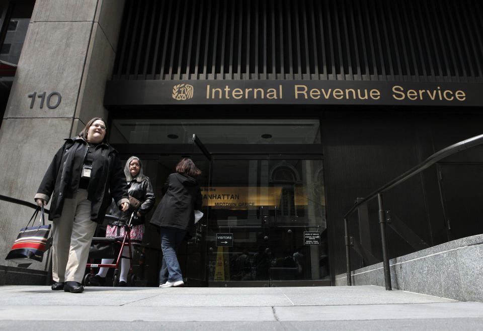 Women walk out of an Internal Revenue Service office in New York. Taxpayers had until April 18 to file their taxes on time this year. (Credit: Lucas Jackson, Reuters) 
