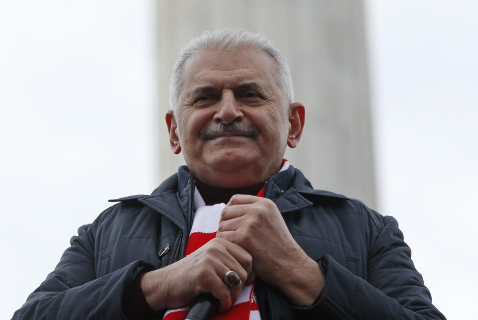 Binali Yildirim, the mayoral candidate for Istanbul, talks to supporters at a rally of his ruling Justice and Development Party's (AKP), in Istanbul, Friday, March 29, 2019, ahead of local elections scheduled for March 31, 2019. (AP Photo/Lefteris Pitarakis)