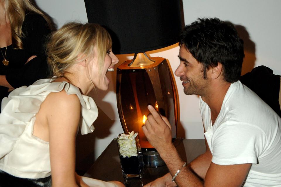 Kristen Bell and John Stamos during US Weekly's 2006 Hot Hollywood: Fresh 15 - Inside at Area in West Hollywood, California, United States.
