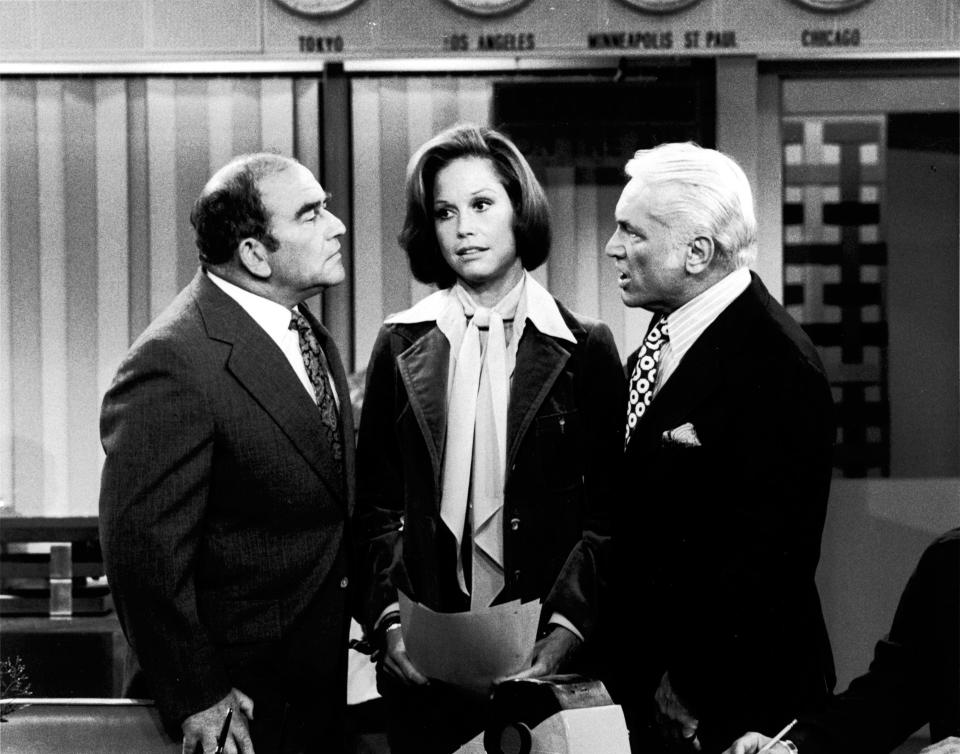 News producer "Mr. Grant" (Asner), Mary Richards (Mary Tyler Moore) and anchorman Ted Baxter (Ted Knight) kept things lively at fictional Minneapolis TV station WJM in the 1970s sitcom "The Mary Tyler Moore Show."