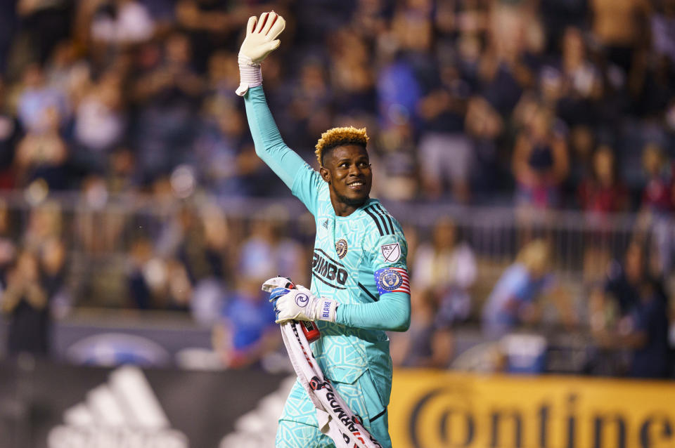 Philadelphia Union's Andre Blake waves to the crowd following the team's MLS soccer match against D.C. United, Friday, July 8, 2022, in Chester, Pa. The Union won 7-0. (AP Photo/Chris Szagola)