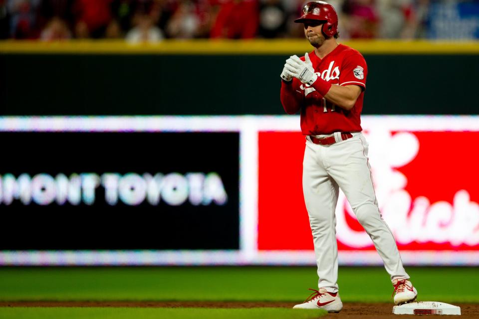 Cincinnati Reds shortstop Kyle Farmer (17) pounds his fist in his hand after hitting a double in the second inning of the MLB baseball game between the Cincinnati Reds and the Washington Nationals on Saturday, Sept. 25, 2021, at Great American Ball Park in Cincinnati. 