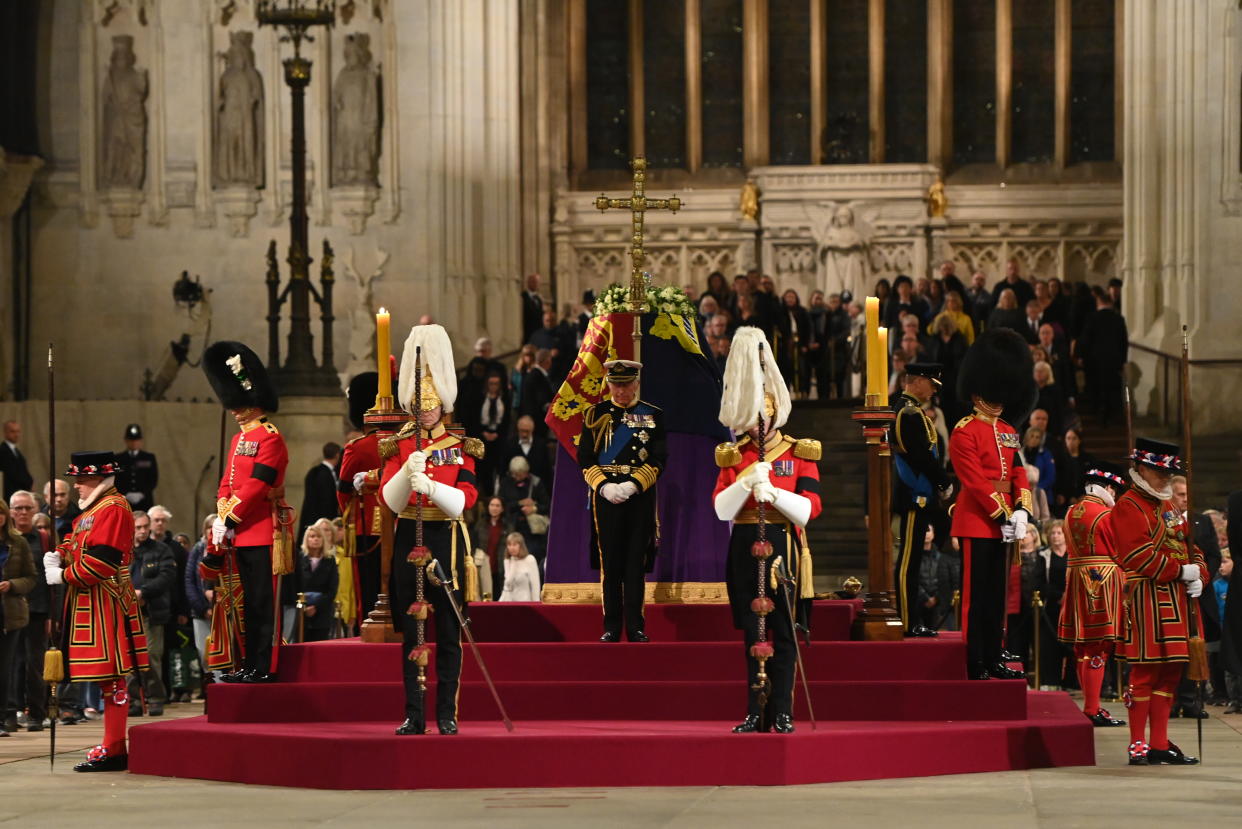 King Charles III, Anne, Princess Royal, Prince Andrew, Duke of York and Prince Edward, Earl of Wessex hold a vigil beside the coffin of their mother, Queen Elizabeth II, as it lies in state on the catafalque in Westminster Hall, at the Palace of Westminster, ahead of her funeral on Monday, on September 16, 2022 in London, England. (Photo Eddie Mulholland - WPA Pool/Getty Images)