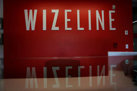 The logo of San Francisco-based software company Wizeline is seen at their offices in Guadalajara, Mexico October 5, 2017. Picture taken October 5, 2017. REUTERS/Daniel Becerril