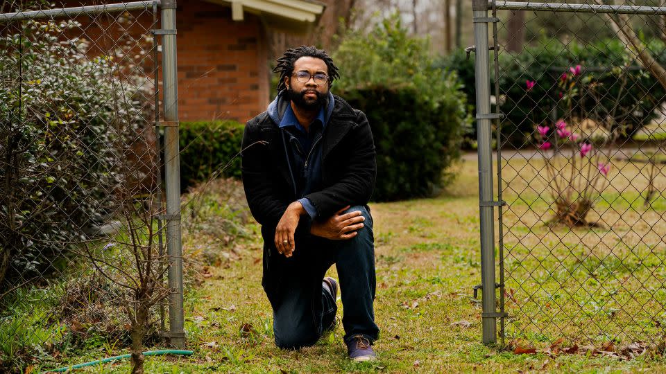 Evan Milligan appears outside his home in Montgomery, Alabama, in February 2022. The civil rights activist was one of the lead plaintiffs in a case that went all the way to the US Supreme Court and upheld a key pillar of the 1965 Voting Rights Act. - Demetrius Freeman/The Washington Post/Getty Images