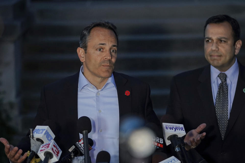 Kentucky Gov. Matt Bevin, with Kentucky Senator Ralph Alvarado, the republican nominee for lieutenant governor, speaks to the media after winning the republican gubernatorial primary, in Frankfort, Ky., Tuesday, May 21, 2019. (AP Photo/Bryan Woolston)