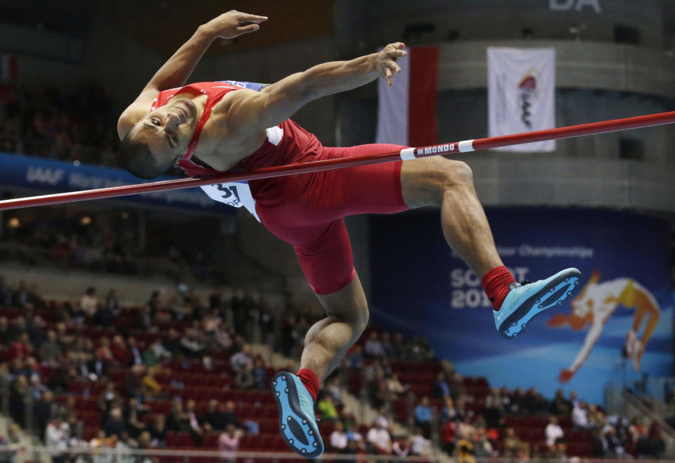 United States' Ashton Eaton makes an attempt in the high jump of the men's heptathlon during the Athletics Indoor World Championships in Sopot, Poland, Friday, March 7, 2014. (AP Photo/Matt Dunham)