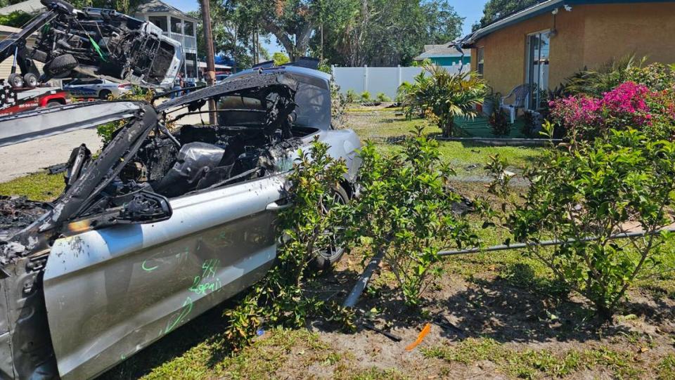 Bradenton police say two stolen vehicles crashed in the 700 block of 12th Ave. W., with one engulfed in flames and the other on its side after hitting the roof of a home.