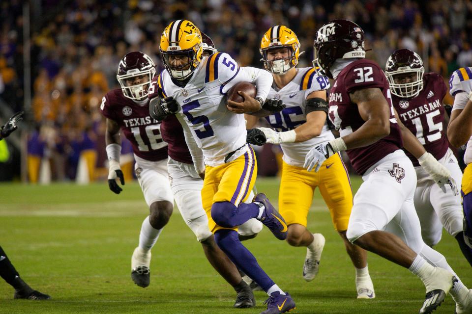 LSU quarterback Jayden Daniels runs with the ball in the red zone during the second quarter against Texas A&M.