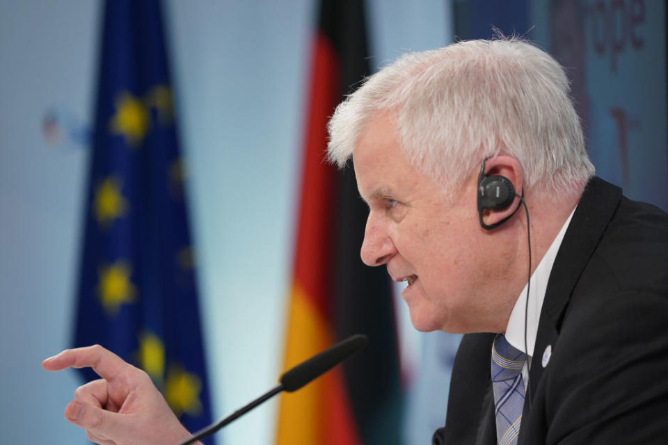 BERLIN, GERMANY - JULY 07: German Interior Minister Horst Seehofer speaks to the media via video conference following a virtual informal meeting of European Union interior ministers during the novel coronavirus pandemic on July 07, 2020 in Berlin, Germany. The meeting, which is being held via video monitors, concentrated on the rescue of migrants at sea and the cooperation of EU member states police forces. Germany is hosting the conference as part of its current presidency of the European Council. (Photo by Sean Gallup/Getty Images)