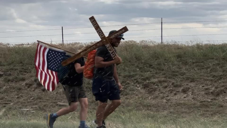 Jesse Boyd said he and his family were on a journey across America, carrying a cross and flag, when a man confronted them. Court documents say that confrontation turned violent, with Boyd being arrested, and others, including his children, being handcuffed.