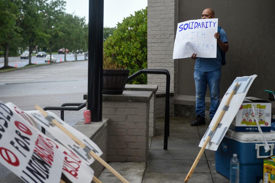 Union worker Stephen Wilkins protests outside of the Starbucks off Robert C. Daniel Jr. Parkway on Tuesday, July 19, 2022. 