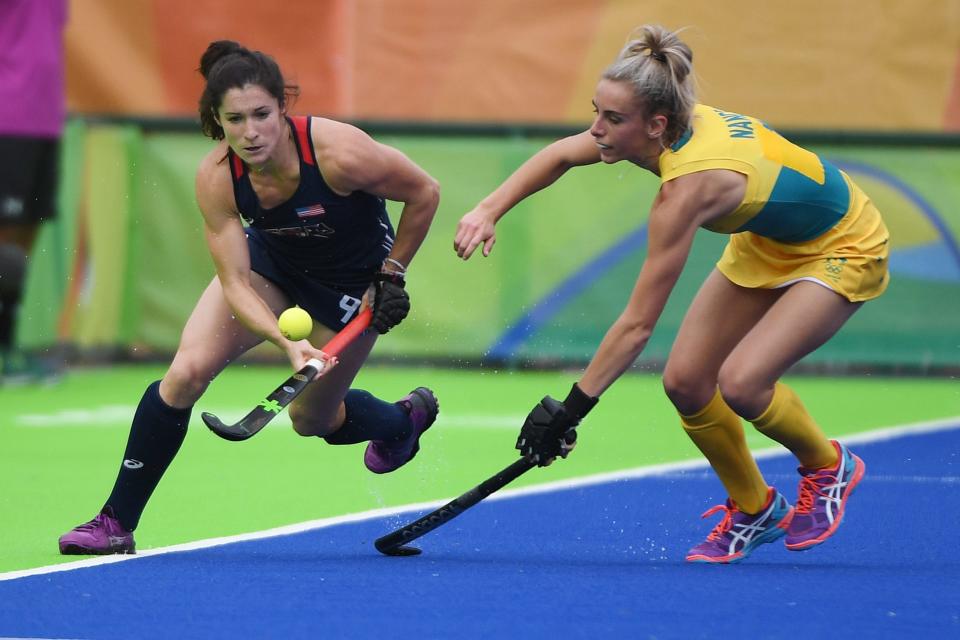 United States and Cherry Hill native midfielder Michelle Vittese (9) controls the ball as Australia defender Anna Flanagan (9) defends during the women's team first round during Monday's game. The Americans won 2-1.