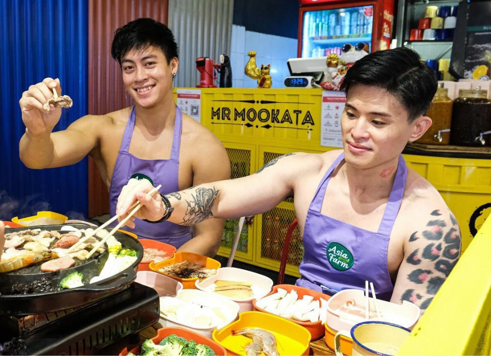 Mr Mookata restaurant in Singapore collaborated with Asia Farm Beverages to hire four handsome, muscular, shirtless guys to serve drinks to diners on 8 January and 15 January 2022. (Photo: Mr Mookata)
