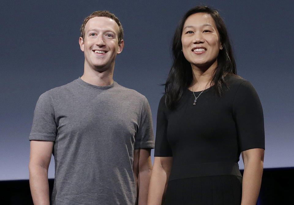 FILE - In this Sept. 20, 2016, file photo, Facebook CEO Mark Zuckerberg and his wife, Priscilla Chan, smile as they prepare for a speech in San Francisco. Supervisors in San Francisco are voting on a nonbinding resolution Tuesday, Dec. 15 to condemn the naming of the city's public hospital for Zuckerberg and his wife in 2015 after the couple gave $75 million toward the building of a new acute and trauma center. The resolution does not have the force of law and would not require the hospital to do anything if approved. (AP Photo/Jeff Chiu, File)