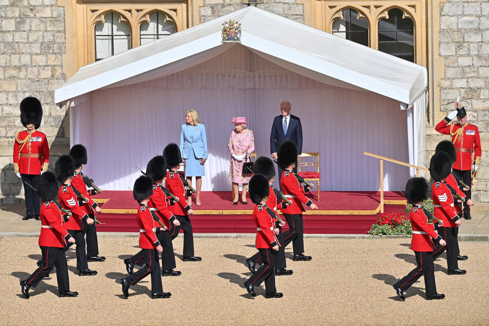 <p>The Bidens were welcomed at the dais in the Quadrangle of the castle, and a Guard of Honor formed of the Queen's Company First Battalion Grenadier Guards gave the First Couple a royal salute.</p>