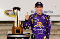 CHARLOTTE, NC - OCTOBER 15: Matt Kenseth, driver of the #17 Fluidmaster Ford, poses in Victory Lane after winning the NASCAR Sprint Cup Series Bank of America 500 at Charlotte Motor Speedway on October 15, 2011 in Charlotte, North Carolina. (Photo by Jason Smith/Getty Images for NASCAR)