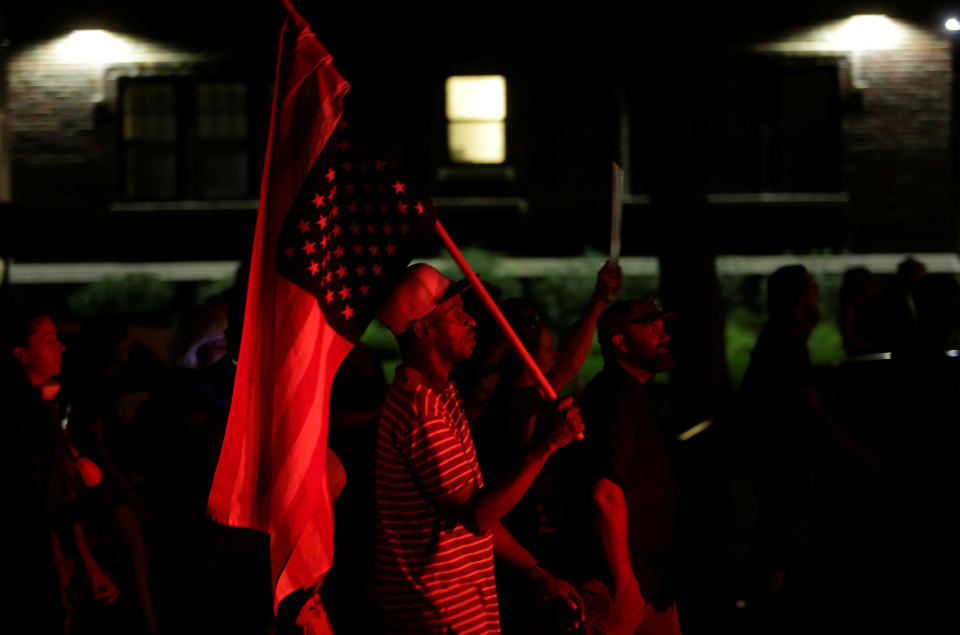 <p>People march the day after the not guilty verdict in the murder trial of Jason Stockley, a former St. Louis police officer, charged with the 2011 shooting of Anthony Lamar Smith, who was black, in St. Louis, Mo., Sept. 16, 2017. (Photo: Joshua Lott/Reuters) </p>