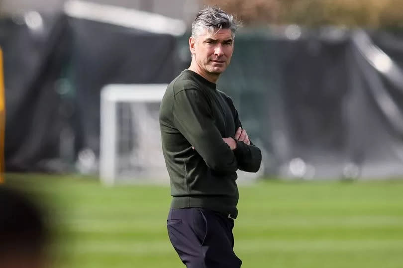 New Liverpool sporting director Richard Hughes watches on during a Bournemouth training session