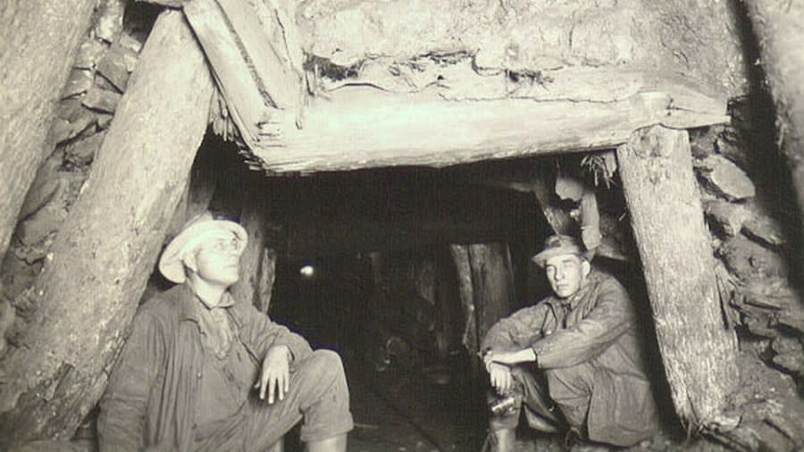 In this undated photo, two men rest inside the Pabst Mine in Ironwood, Michigan. (Courtesy Michigan Technological University)