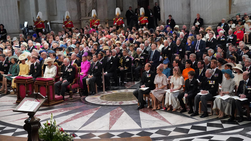 Members of the royal family attend the National Service of Thanksgiving at St. Paul's Cathedral, London, on day two of the Platinum Jubilee celebrations for Queen Elizabeth II, June 3, 2022. Harry and Meghan, the Duke and Duchess of Sussex, are seated across the aisle from his brother, Prince William, and father, Prince Charles. / Credit: Victoria Jones/PA Images via Getty Images