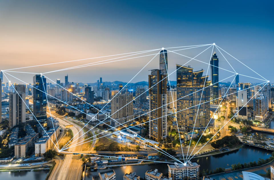 Network connections across the skyline of Shenzhen, China.